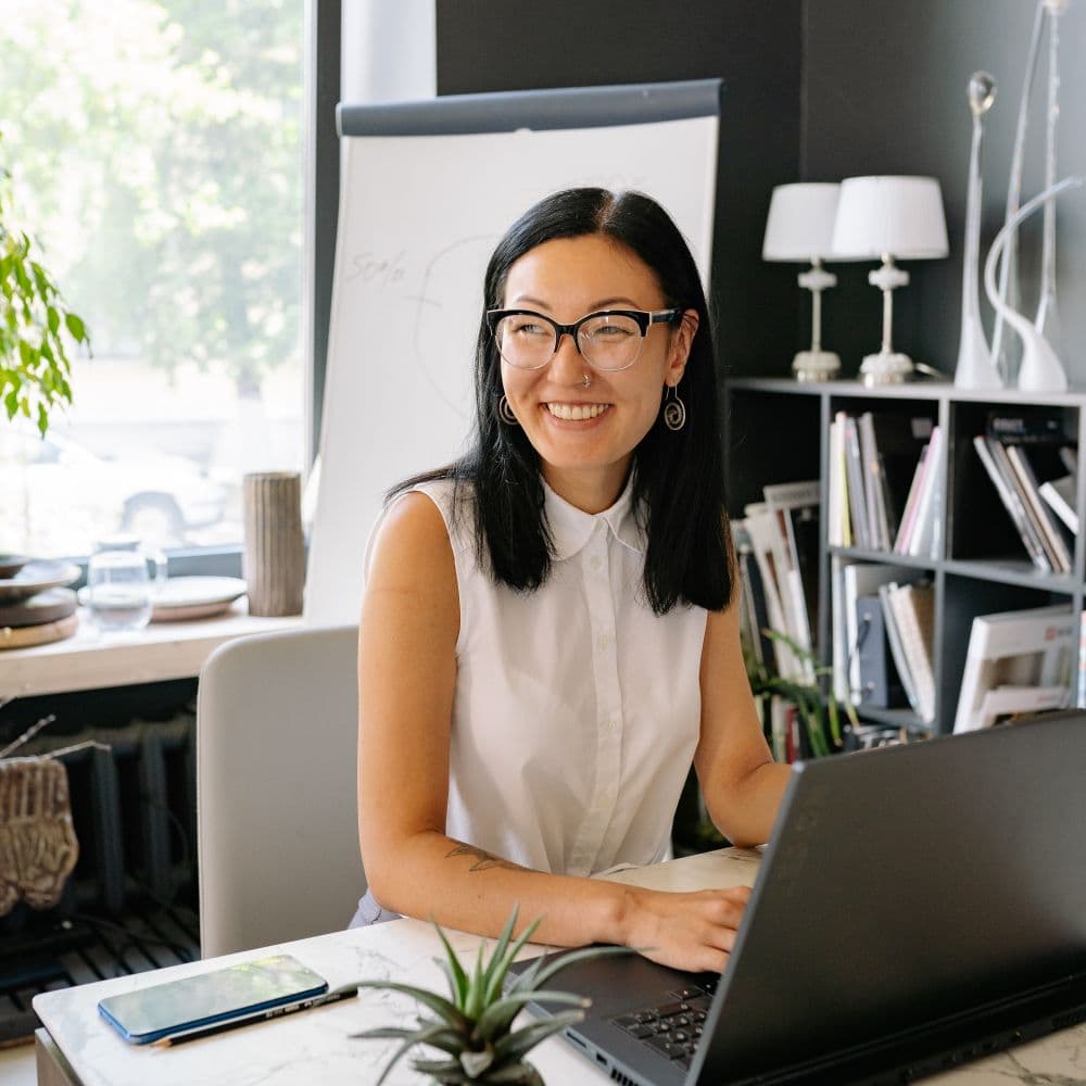 A member of the LeadMighty team at her desk